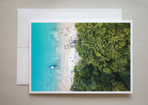 This greeting card is a drone photograph of a tropical beach by photographer Alicia Campbell.