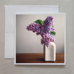 You can just smell the fresh lilacs in a Bud vase in this photo card by photographer Jennifer Echols.  Love Spring!