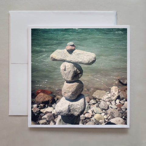 Strolling along a river, photographer Jennifer Echols finds a rock sculpture at the rivers edge in this summery photo card.