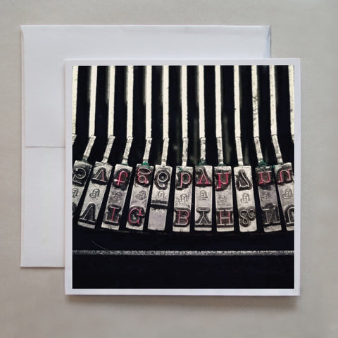 This photo card shows details of the letters on a vintage typewriter by photographer Jennifer Echols. 