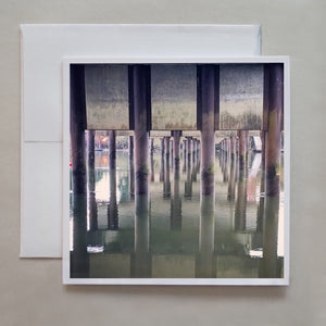 Under the bridge, you can see structural patterns amongst calm water in this photo greeting card by Jennifer Echols.