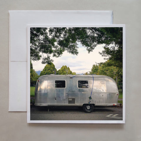 An old silver camper van is parked in this greeting card by photographer Jennifer Echols.  What a beaut!