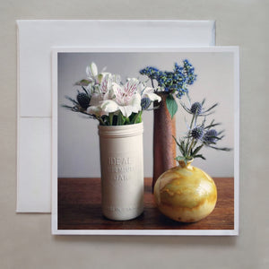  This beautiful photo card shows three vases filled with stunning flowers by photographer Jennifer Echols.